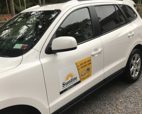 Sunlite Home Inspection Services Car with banner